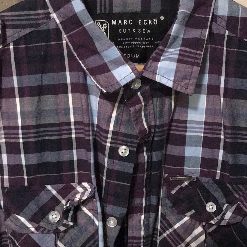 Marc Echo Cut & Sew short sleeve polo shirt.